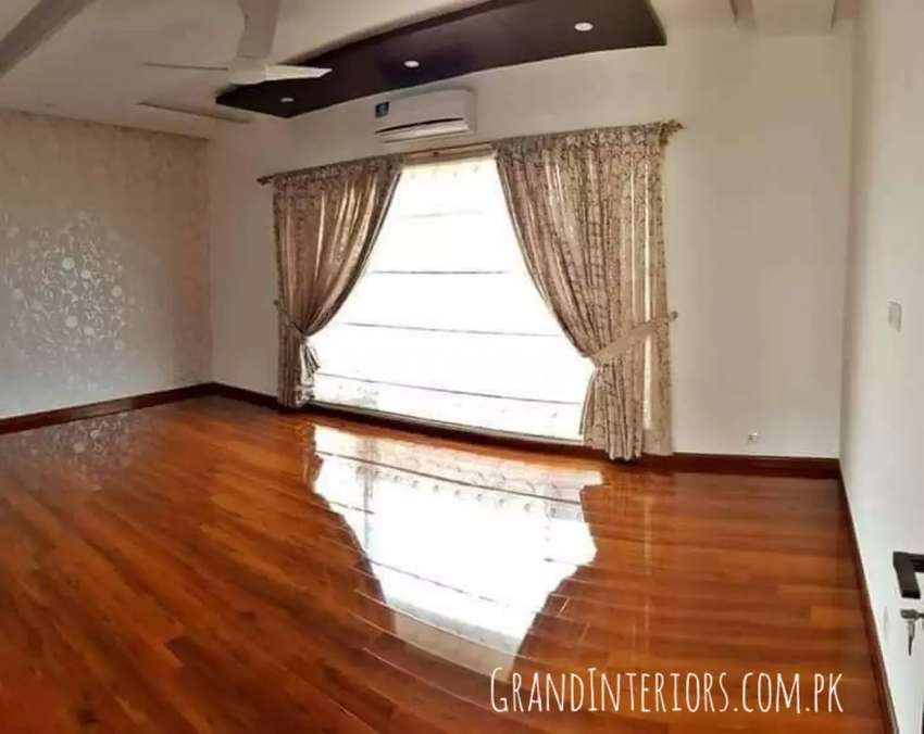 Vinyl flooring and wooden floor Or wood flooring by Grand Interiors