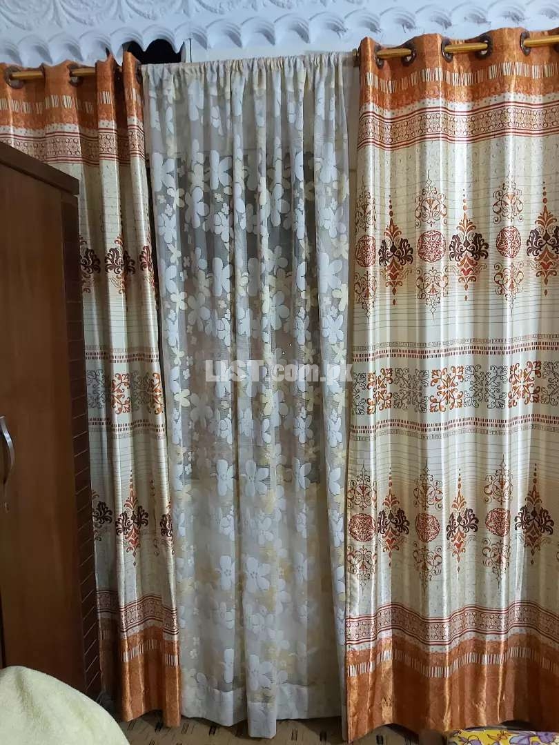2 x Silk Curtains and 1 x Net Curtain