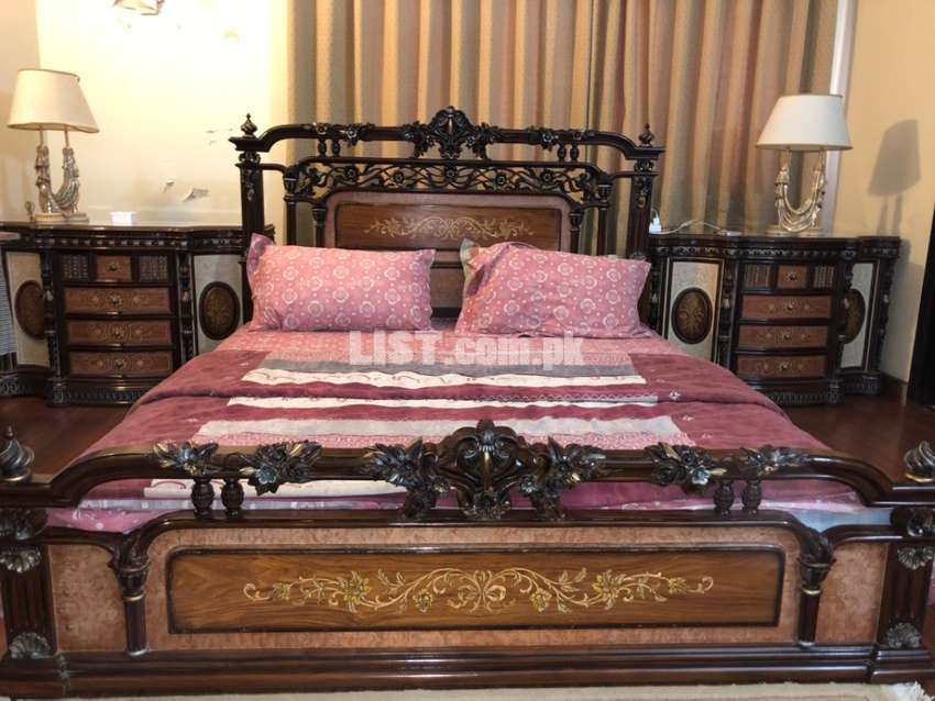 Bed with 2 side-tables made by Muhammad Hussain.