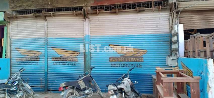 COMMERCIAL SHOP FOR RENT ON 300 FEET MAIN ROAD LAYAQUTABAD NO 4