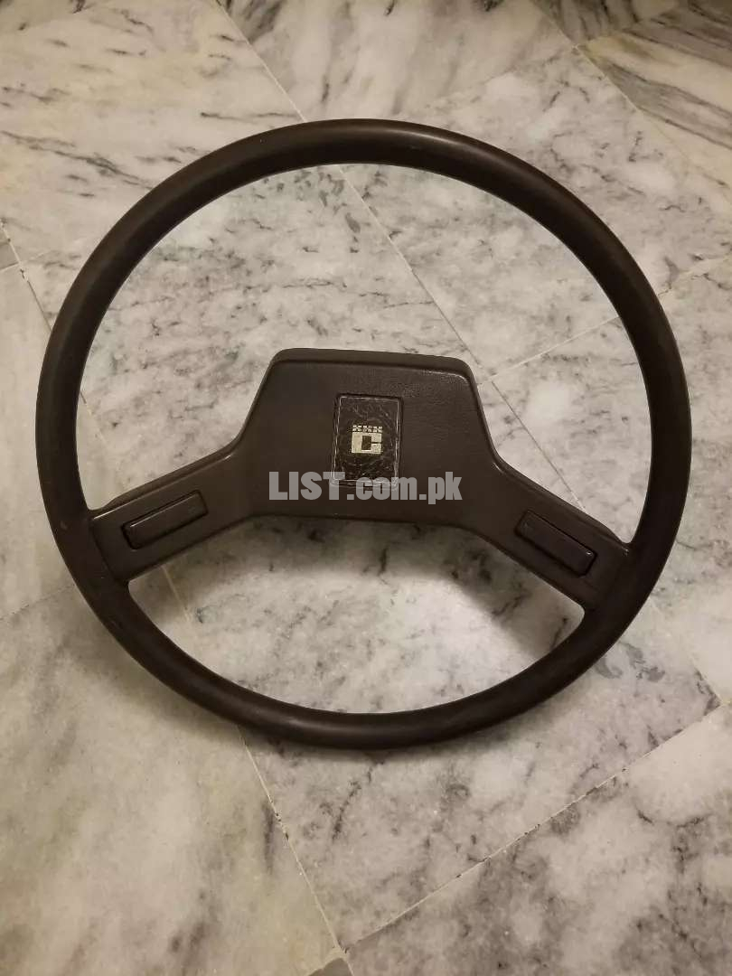 1986 Corolla front grill and steering wheel..