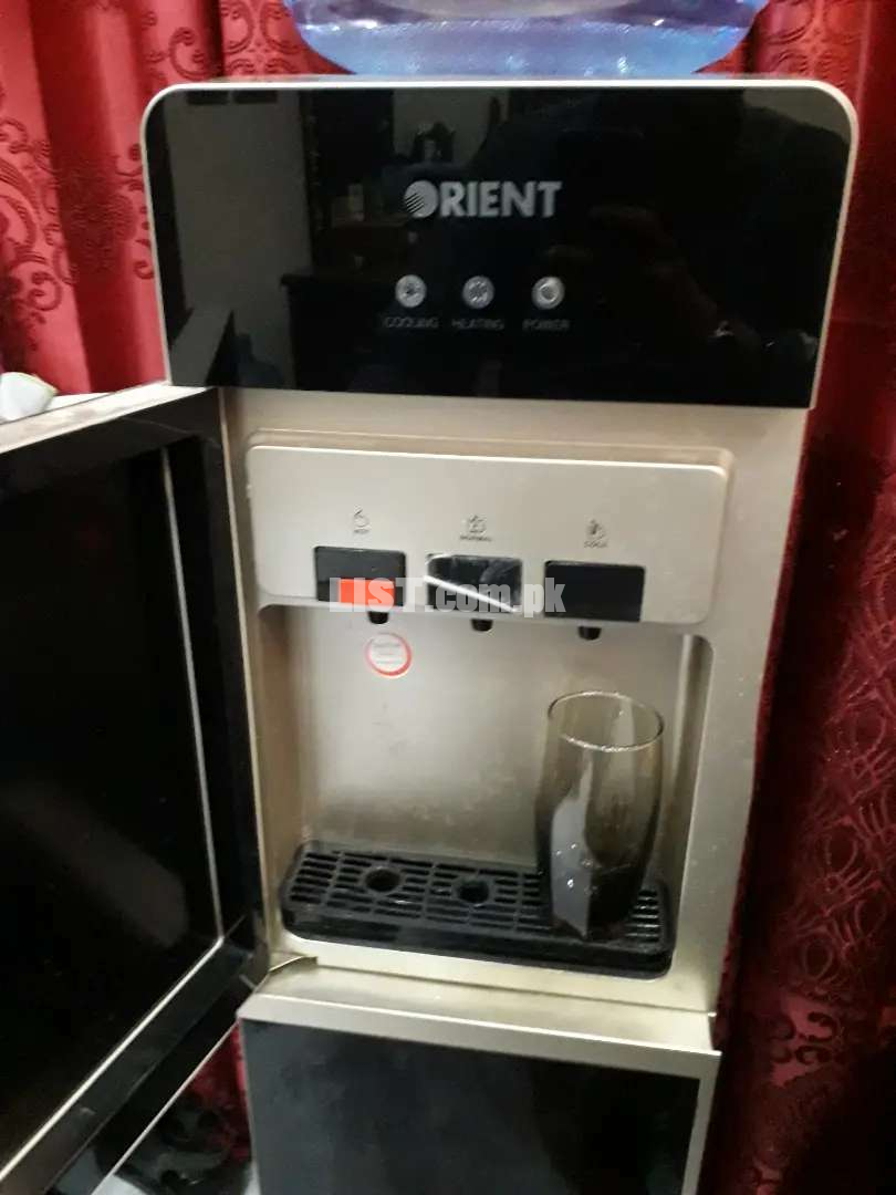 Almost new orient water dispensor complete warranty .10/10 condition