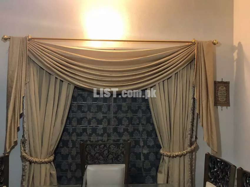 Beautifully designed 8 curtains with 4 pelmets and 8 belts.