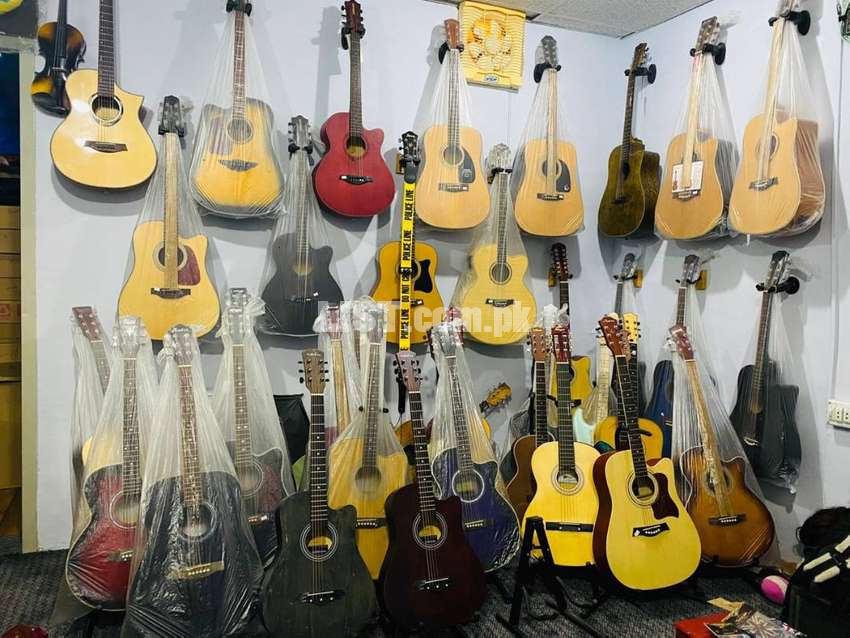 10 to 40%Off 42 inch jumbo Acoustic Guitars at Happy club