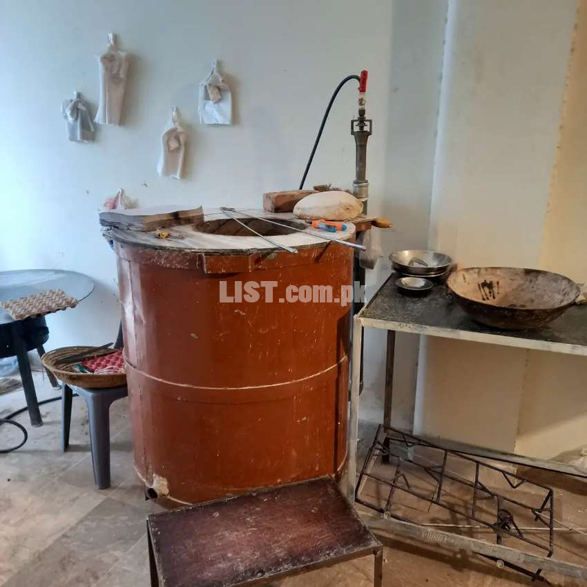Movable Clay tandoor completely fitted in iron frame