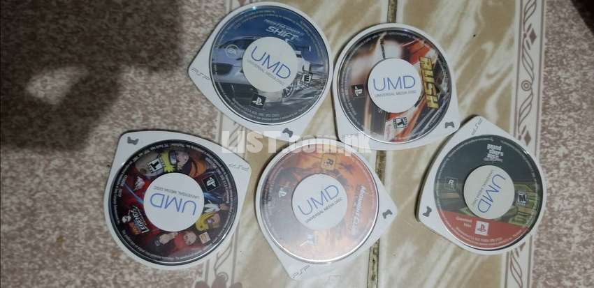 psp up for selling5 UMD cds 2 chargers psp bag and psp