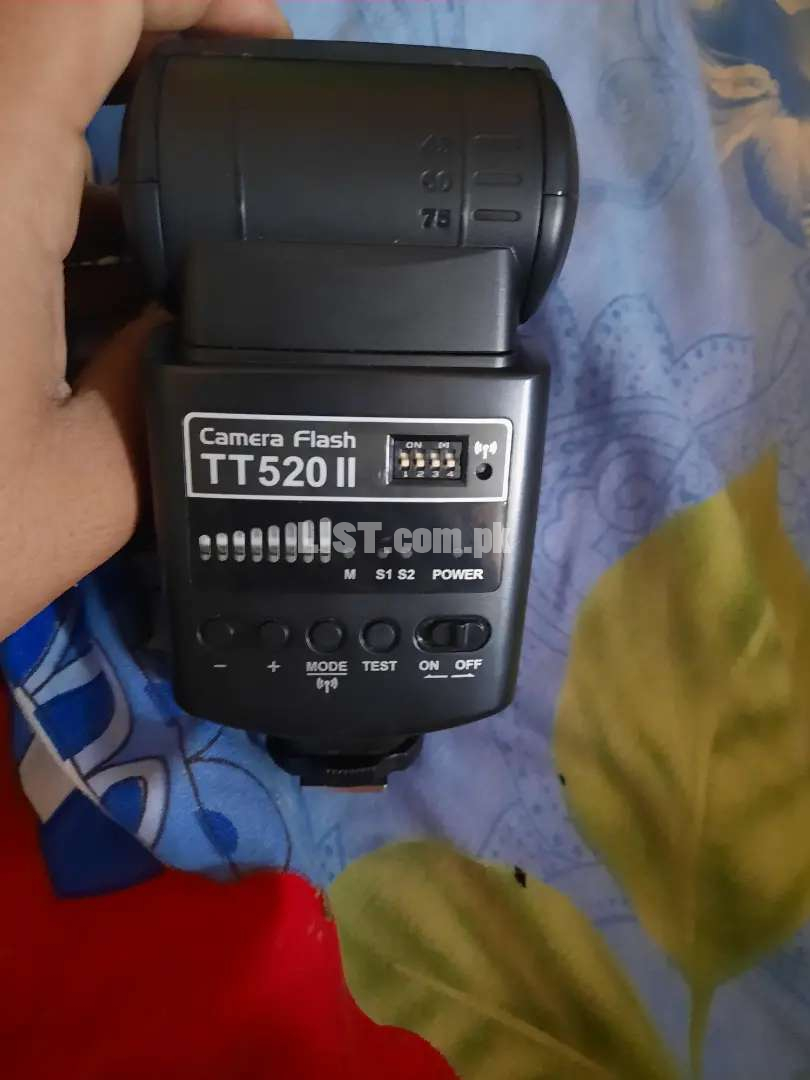 canon 75 300 lens auto flash gun