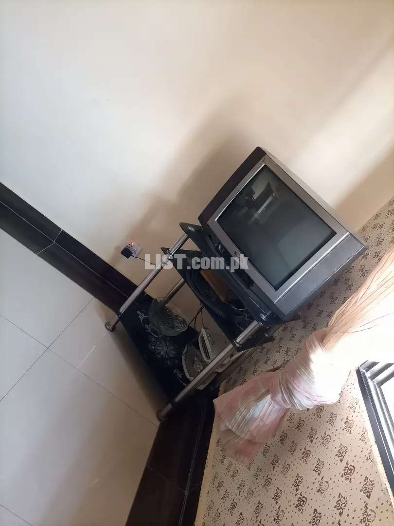 TV with TV trolley.
