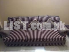 7 Seater sofa set and center table for sale.