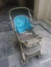 Kids Pram in Good Condition Available For Sell..