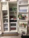 Haier fridge and freezer, double door, maroon colour, slightly used