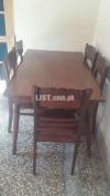 Dining table with 6 chairs is for sale