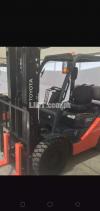 Forklift operator and reach truck