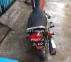 Honda 125 new adition in red colour first hand jxt 15000 use