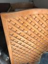 Light brown wooden cot