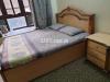 Double bed with side tables and single bed